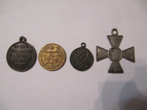 Три медали и Георгиевский крест!!