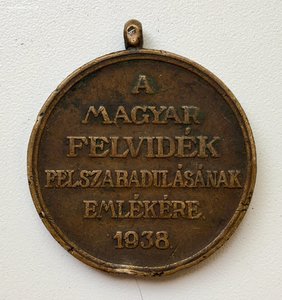 Венгерская и немецкая медали. 1930-е годы