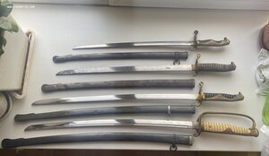 четыре военных меча японских. продаю.