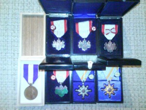 Шесть орденов и одна медаль.