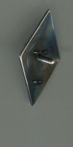 Ромб ВИ в серебре.