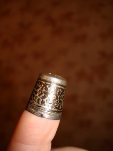 Серебряный напёрсток