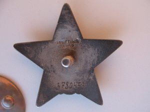 Красная звезда(бормашина) на танкиста.