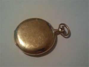 Золотые часы  MOVADO surete