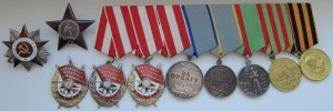 Три ордена Красного Знамени, ОВ-2, КЗ, медали