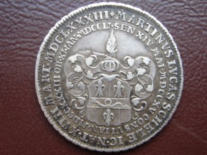 Монетовидный жетон, подскажите?