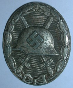 Знак за ранение, бунтметалл.