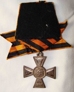 Георгиевский крест -частник 3 степени.