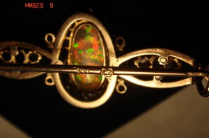 Брошь золото 56 пр. Белый опал, алмазы.