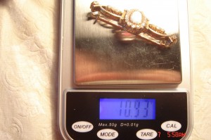 Брошь золото 56 пр. Белый опал, алмазы.