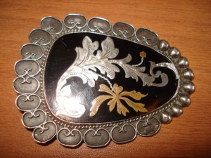 Серебряная брошь с кубы стоимость