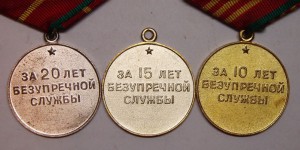 Милицейская выслуга с двумя удостоверениями.