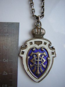 Интересный большой жетон____серебро, эмали...