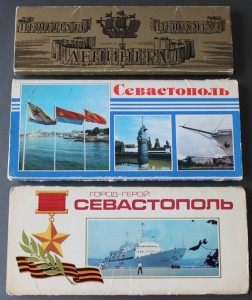 Много наборов открыток