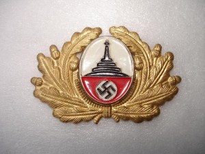 Кокарда общества ветеранов.