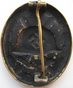 "За ранение" в чёрном ( РАННИЙ ЗНАК! )