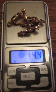 Золотой гарнитур с гранатами и фианитами. 585 пр.