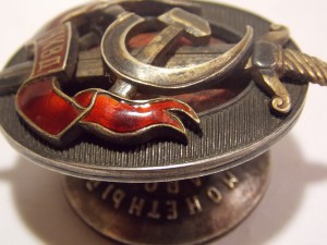 Знак НКВД с кучей доков и фотографий.