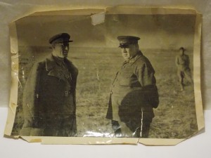 Знак НКВД с кучей доков и фотографий.