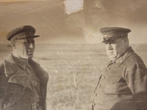 Знак НКВД с кучей доков и фотографий.