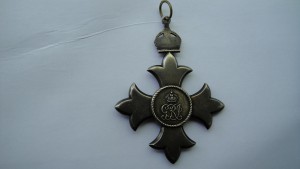 Орден Британской империи с грамотой от короля Англии.