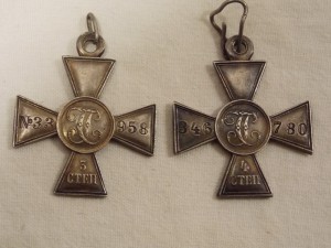 Георгиевские кресты 3-й (№ 33958) и 4-й (№ 346780) степени.