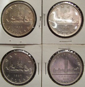 Канада 4$ серебро !935,36,37 и 39 гг.