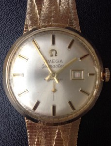 Omega золото