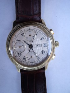 TISSOT золото 18 карат..классные
