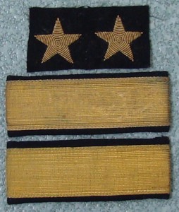 Нашивки на тужурку капитана 1го ранга