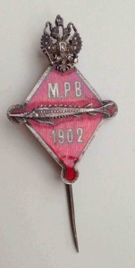 Красивый знак-жетон с эмалью.