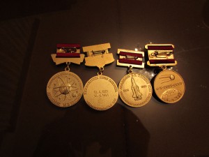 Четыре разных знака космической тематики, ММД.