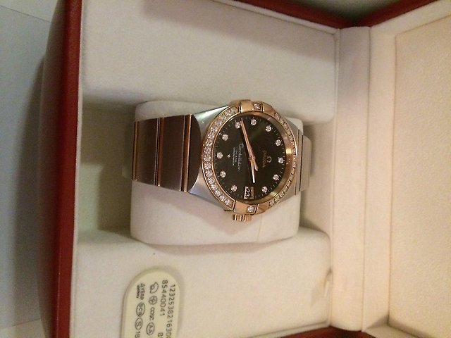 Часы Omega золото