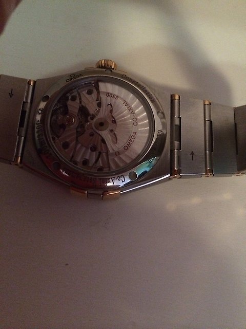 Часы Omega золото