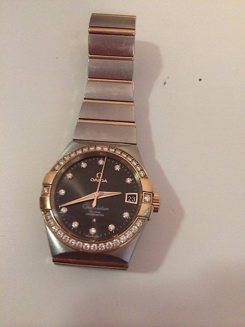 Часы Omega золото