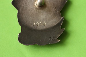 Стахановцу Золотоплатиновой промышленности №1454.