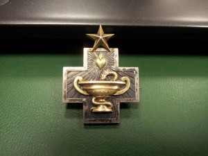 Знак Общества Самаритян СПБ