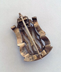 Знак для служащих Детских приютов Ведомства имп. Марии