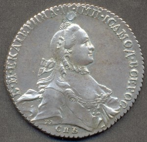 Рубль 1764 года дырявый, но красивый!