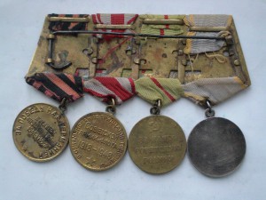 Латунная колодка с медалями.