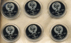 6 монет "Барселона" в капсулах.