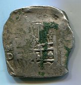 пара древних серебренных монет.
