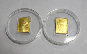 50 рублей золото Леопард 2011г. и Мишка 2012г.