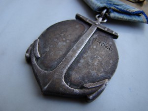 Медаль Ушакова № 14328.