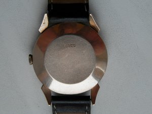 Швейцарские золотые часы DOXA