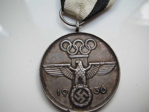 За сотрудничество на Олимпийских играх 1936 года