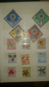 7 альбомов марок разных стран требуется оценка с последующей