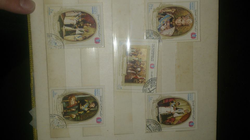 7 альбомов марок разных стран требуется оценка с последующей