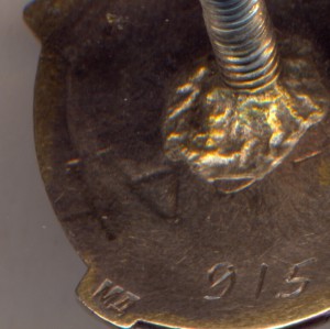 Отличнику Дальстроевцу СССР. № 915 . ( серебро).