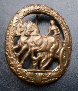 Спортивный знак за управление повозкой